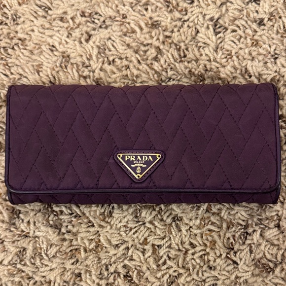 Prada Handbags - Prada Purple Quilted Slim Wallet